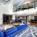 Spacious clubhouse with large windows and plenty of seating 